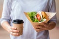 Business woman having lunch, Burger with coffee on time break Royalty Free Stock Photo