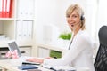 Business woman with headset working at office