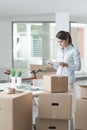 Business woman in her new office using a tablet Royalty Free Stock Photo