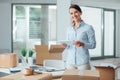 Business woman in her new office using a tablet Royalty Free Stock Photo