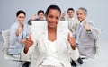 Business woman and her team with thumbs up Royalty Free Stock Photo