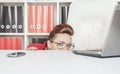Business woman hiding behind table and afraid Royalty Free Stock Photo