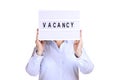 Business woman hold signboard with vacancy text on it. Recruitment and hiring concept