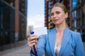 Business woman holding badge in hand Royalty Free Stock Photo