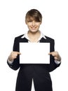 business woman holding blank paper and smiling, front view, isolated Royalty Free Stock Photo