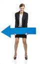 Business woman holding a blue arrow Royalty Free Stock Photo