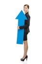 Business woman holding a blue arrow Royalty Free Stock Photo