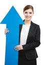 Business woman holding a blue arrow Royalty Free Stock Photo