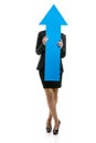 Business woman holding a blue arrow Royalty Free Stock Photo