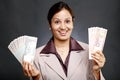 Business woman holding currency notes Royalty Free Stock Photo