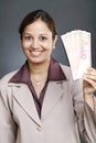 Business woman holding currency notes Royalty Free Stock Photo