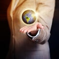 Business woman holding earth globe in her hand Royalty Free Stock Photo