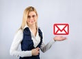 Business woman holding a email message icon Royalty Free Stock Photo