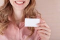 Business woman holding her visiting card Royalty Free Stock Photo