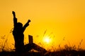 Business woman holding laptop sunset silhouette Royalty Free Stock Photo