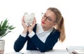 Business woman is holding piggy bank. Saving concept Royalty Free Stock Photo