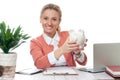Business woman is holding piggy bank. Saving concept Royalty Free Stock Photo