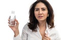 Business woman holding plastic bottle of water