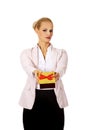 Business woman holding present box Royalty Free Stock Photo