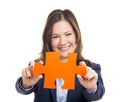 Business woman holding a puzzle piece Royalty Free Stock Photo