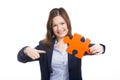 Business woman holding a puzzle piece Royalty Free Stock Photo