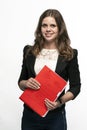 Business woman is holding a red document folder. Royalty Free Stock Photo