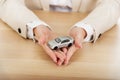 Business woman holding a toy car. Royalty Free Stock Photo