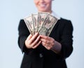 Business woman holding up dollars Royalty Free Stock Photo