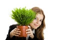 Business Woman holding a vase with a plant Royalty Free Stock Photo