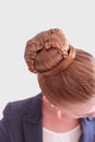 Business Woman with Intricate Bun Hairstyle