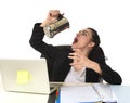 Business woman at laptop computer desk drinking coffee excited and anxious in caffeine addiction Royalty Free Stock Photo