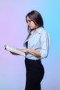 Business woman with a large book in her hands Royalty Free Stock Photo