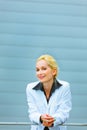 Business woman leaning on railing at building Royalty Free Stock Photo