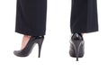 Business woman legs wearing black leather shoes with high heels Royalty Free Stock Photo