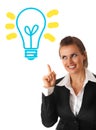 Business woman looking at lamp with rised finger