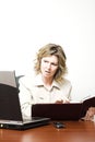 Business woman looking at laptop