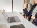 A business woman looking at a laptop in happy mood or joyful acting because of work well done and success in job. gaining a big Royalty Free Stock Photo