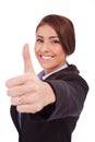 Business woman making thumb up ok gesture