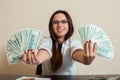 Business woman with money fans in hands Royalty Free Stock Photo