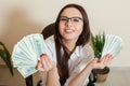 Business woman with money fans in hands Royalty Free Stock Photo