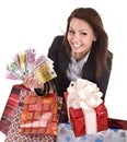 Business woman with money, gift box and bag. Royalty Free Stock Photo