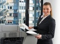Business woman next to office printer Royalty Free Stock Photo