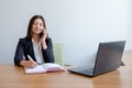 Business woman with notebook, calendar and mobile phone at work. Royalty Free Stock Photo