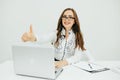 Business woman with notebook in the office with okey gesture Royalty Free Stock Photo