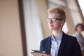 Business woman at office with tablet in front as team leader Royalty Free Stock Photo