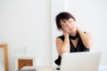 Business woman overwork on laptop computer and neck pain with at work in office, girl stress and illness chronic Royalty Free Stock Photo