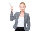 Business woman with pen point up Royalty Free Stock Photo