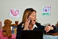 Business woman on phone looks at watch and is late Royalty Free Stock Photo