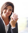 Business woman, piggybank and portrait with smile for savings, money planning and personal finance goal. Female