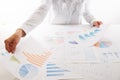 Business woman pointing at graph document close-up Royalty Free Stock Photo